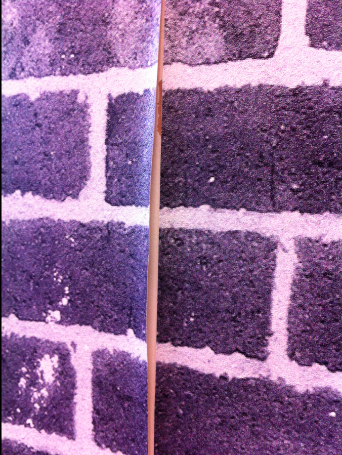 Wallpaper peeling off on a recently plastered wall. No sealer on Wallpaper peeling off on a recently plastered wall. No sealer on